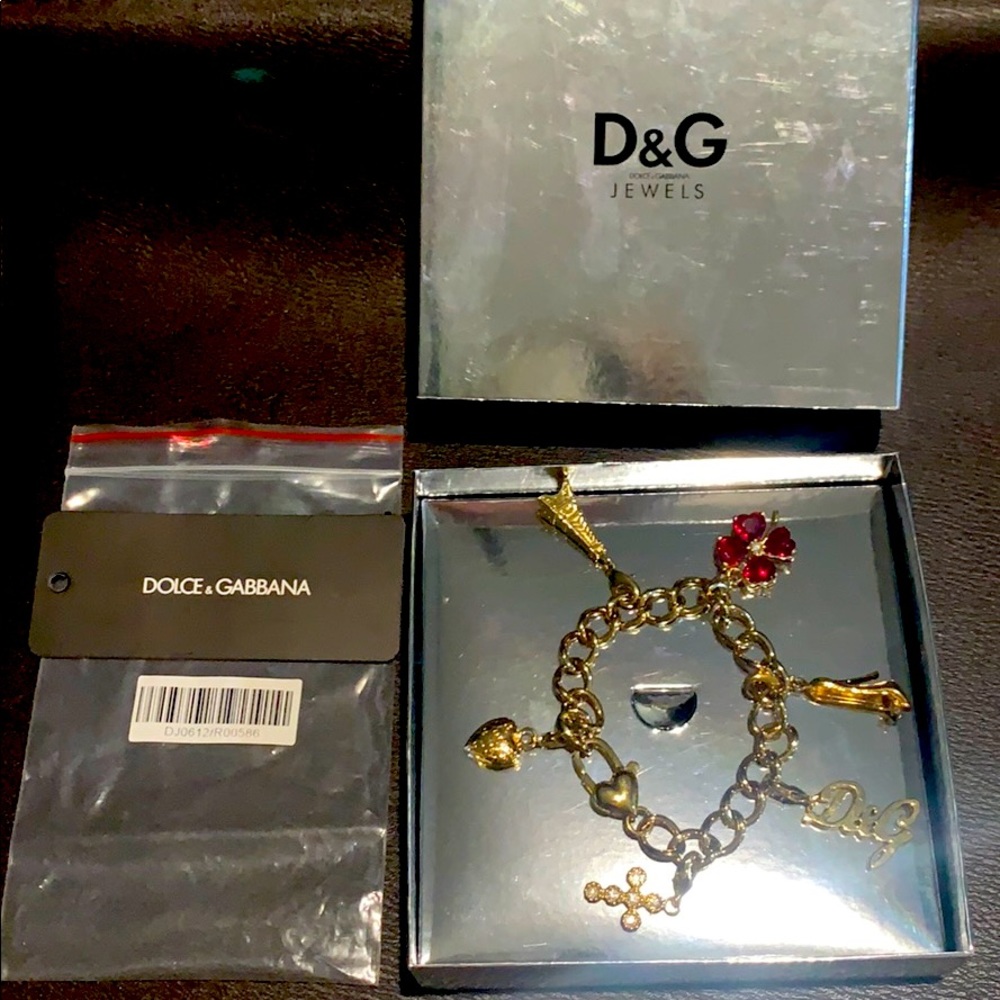Authentic Dolce & Gabbana 6 charm gold bracelet